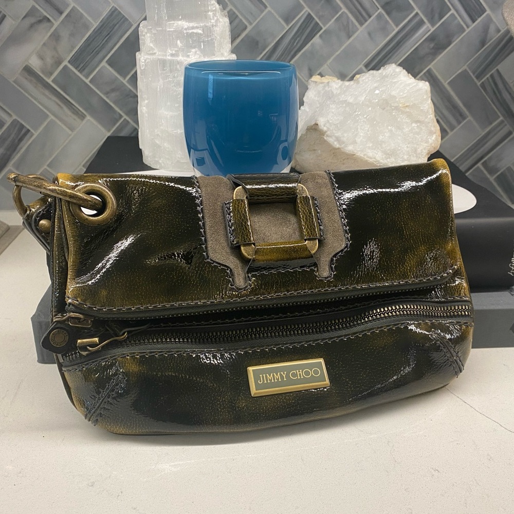 Jimmy Choo fold over clutch in unique gray green color patent leather